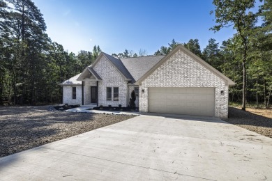 Brand new 1885 square foot home on lovely lot. Trees surround on Ponce De Leon Golf Course in Arkansas - for sale on GolfHomes.com, golf home, golf lot