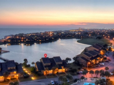 Experience exceptional lakefront living in this exquisitely on Seascape Golf Course in Florida - for sale on GolfHomes.com, golf home, golf lot