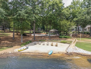 Experience the ultimate Lake Oconee lifestyle in this charming on Great Waters Course At Reynolds Plantation in Georgia - for sale on GolfHomes.com, golf home, golf lot