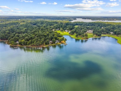 Experience the ultimate Lake Oconee lifestyle in this charming on Great Waters Course At Reynolds Plantation in Georgia - for sale on GolfHomes.com, golf home, golf lot