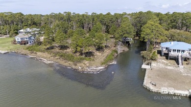 Approx. 300' Lagoon waterfront! This property is ideal!  2 lots on Peninsula Golf and Racquet Club in Alabama - for sale on GolfHomes.com, golf home, golf lot