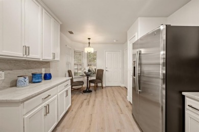 Step into this beautifully updated Gray Myst floorplan featuring on Frisco Lakes Golf Course in Texas - for sale on GolfHomes.com, golf home, golf lot