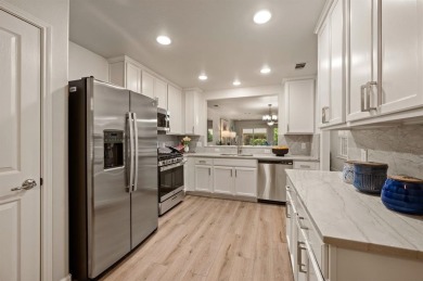 Step into this beautifully updated Gray Myst floorplan featuring on Frisco Lakes Golf Course in Texas - for sale on GolfHomes.com, golf home, golf lot