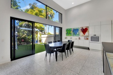 Experience luxury living at its finest in this elegant & on Broken Sound Golf and Club  in Florida - for sale on GolfHomes.com, golf home, golf lot
