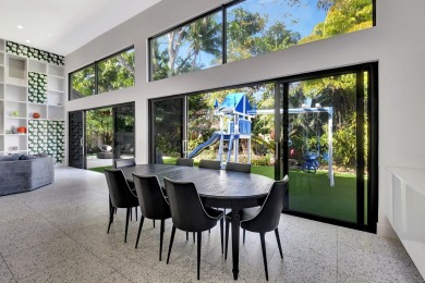 Experience luxury living at its finest in this elegant & on Broken Sound Golf and Club  in Florida - for sale on GolfHomes.com, golf home, golf lot