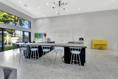 Experience luxury living at its finest in this elegant & on Broken Sound Golf and Club  in Florida - for sale on GolfHomes.com, golf home, golf lot