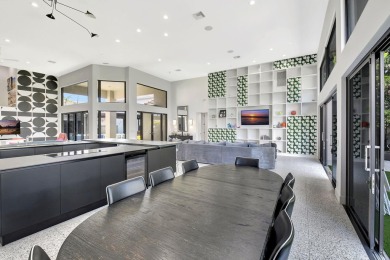 Experience luxury living at its finest in this elegant & on Broken Sound Golf and Club  in Florida - for sale on GolfHomes.com, golf home, golf lot