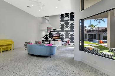 Experience luxury living at its finest in this elegant & on Broken Sound Golf and Club  in Florida - for sale on GolfHomes.com, golf home, golf lot