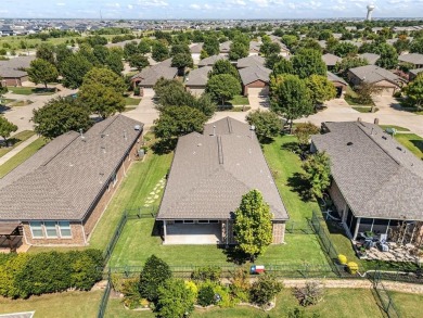 Step into this beautifully updated Gray Myst floorplan featuring on Frisco Lakes Golf Course in Texas - for sale on GolfHomes.com, golf home, golf lot