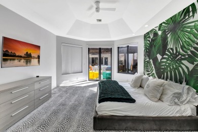 Experience luxury living at its finest in this elegant & on Broken Sound Golf and Club  in Florida - for sale on GolfHomes.com, golf home, golf lot