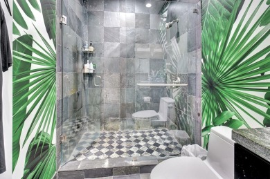 Experience luxury living at its finest in this elegant & on Broken Sound Golf and Club  in Florida - for sale on GolfHomes.com, golf home, golf lot