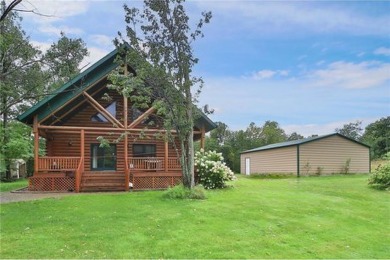 Experience the charm of this stunning log home on Northwood on Hardwoods Golf Club At Mille Lacs in Minnesota - for sale on GolfHomes.com, golf home, golf lot