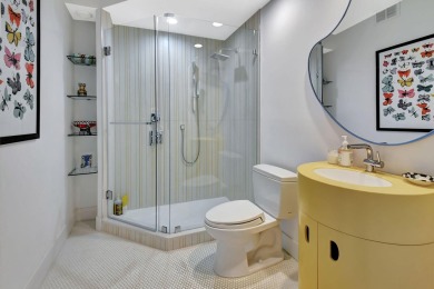 Experience luxury living at its finest in this elegant & on Broken Sound Golf and Club  in Florida - for sale on GolfHomes.com, golf home, golf lot