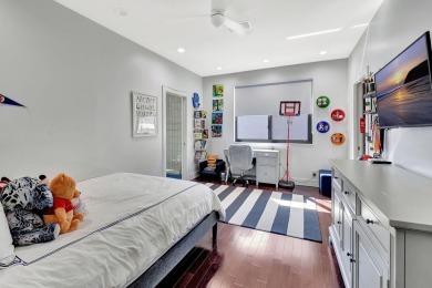 Experience luxury living at its finest in this elegant & on Broken Sound Golf and Club  in Florida - for sale on GolfHomes.com, golf home, golf lot