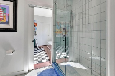 Experience luxury living at its finest in this elegant & on Broken Sound Golf and Club  in Florida - for sale on GolfHomes.com, golf home, golf lot