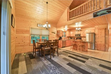 Experience the charm of this stunning log home on Northwood on Hardwoods Golf Club At Mille Lacs in Minnesota - for sale on GolfHomes.com, golf home, golf lot