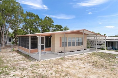 Welcome to this charming and refreshed 2-bedroom, 2-bathroom on Brookridge Country Club in Florida - for sale on GolfHomes.com, golf home, golf lot