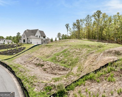 Large cleared lot in coveted Governors Towne Club community on The Governors Towne Club in Georgia - for sale on GolfHomes.com, golf home, golf lot