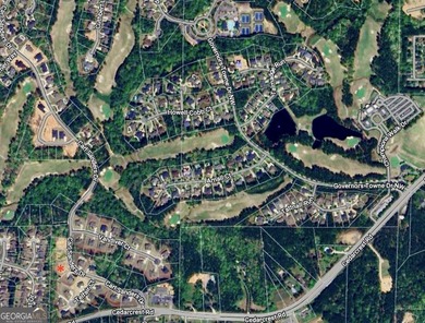 Large cleared lot in coveted Governors Towne Club community on The Governors Towne Club in Georgia - for sale on GolfHomes.com, golf home, golf lot