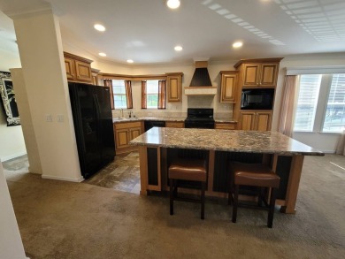 Looking for that big home? This 3/2 home has at least 1700 sq ft on Pelican Pointe 9 Hole Course in Florida - for sale on GolfHomes.com, golf home, golf lot