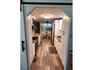 Move-in ready and fully upgraded! Check out this beautiful on Spanish Lakes Country Club in Florida - for sale on GolfHomes.com, golf home, golf lot