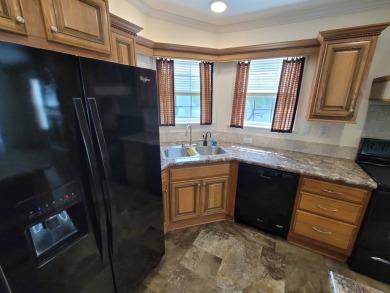Looking for that big home? This 3/2 home has at least 1700 sq ft on Pelican Pointe 9 Hole Course in Florida - for sale on GolfHomes.com, golf home, golf lot