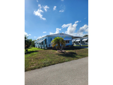 Move-in ready and fully upgraded! Check out this beautiful on Spanish Lakes Country Club in Florida - for sale on GolfHomes.com, golf home, golf lot