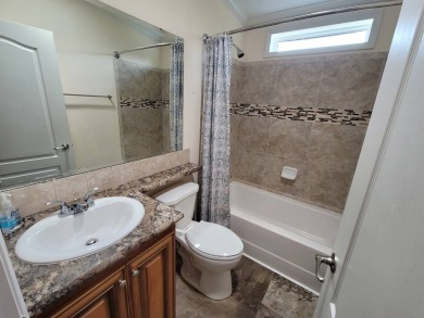 Looking for that big home? This 3/2 home has at least 1700 sq ft on Pelican Pointe 9 Hole Course in Florida - for sale on GolfHomes.com, golf home, golf lot