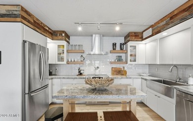 This fully remodeled condo features high end finishes an insane on Arizona Biltmore Golf and Country Club in Arizona - for sale on GolfHomes.com, golf home, golf lot