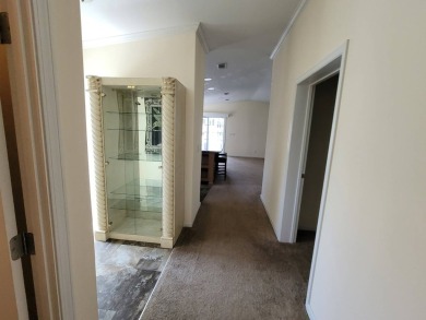 Looking for that big home? This 3/2 home has at least 1700 sq ft on Pelican Pointe 9 Hole Course in Florida - for sale on GolfHomes.com, golf home, golf lot