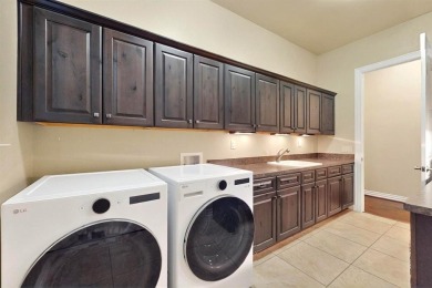 Experience elevated living in this stunning Navarro with Casita on Wildhorse Golf Club of Robson Ranch in Texas - for sale on GolfHomes.com, golf home, golf lot