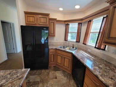 Looking for that big home? This 3/2 home has at least 1700 sq ft on Pelican Pointe 9 Hole Course in Florida - for sale on GolfHomes.com, golf home, golf lot
