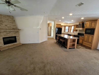 Looking for that big home? This 3/2 home has at least 1700 sq ft on Pelican Pointe 9 Hole Course in Florida - for sale on GolfHomes.com, golf home, golf lot
