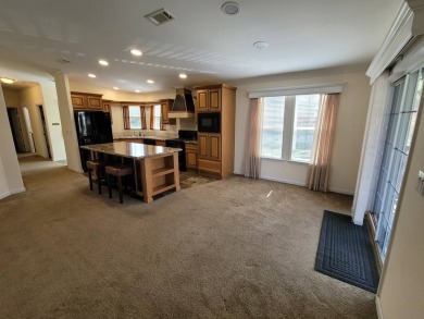 Looking for that big home? This 3/2 home has at least 1700 sq ft on Pelican Pointe 9 Hole Course in Florida - for sale on GolfHomes.com, golf home, golf lot