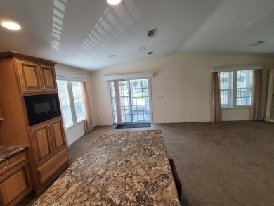Looking for that big home? This 3/2 home has at least 1700 sq ft on Pelican Pointe 9 Hole Course in Florida - for sale on GolfHomes.com, golf home, golf lot