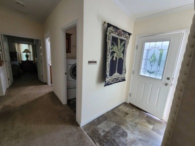 Looking for that big home? This 3/2 home has at least 1700 sq ft on Pelican Pointe 9 Hole Course in Florida - for sale on GolfHomes.com, golf home, golf lot