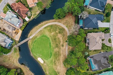 Enter the gated community of Emerald Bay and enjoy golf course on Emerald Bay Golf Club in Florida - for sale on GolfHomes.com, golf home, golf lot