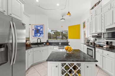 Enter the gated community of Emerald Bay and enjoy golf course on Emerald Bay Golf Club in Florida - for sale on GolfHomes.com, golf home, golf lot