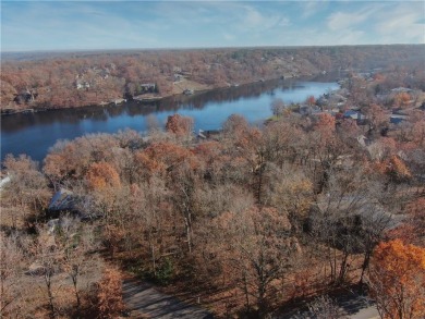 This stunning wooded lot, located near Loch Lomond in Bella on Bella Vista Country Club - Scottsdale in Arkansas - for sale on GolfHomes.com, golf home, golf lot