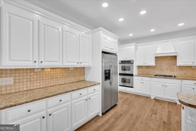 Welcome to 511 Millwood Ct-a beautifully updated 5-bedroom on Bridgemill Golf Club in Georgia - for sale on GolfHomes.com, golf home, golf lot