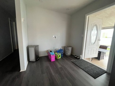 Gorgeous totally remodeled home!!  1,100 Sq Ft.  Addition 3rd on Six Lakes Country Club in Florida - for sale on GolfHomes.com, golf home, golf lot