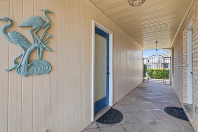 Welcome to effortless coastal living where every day feels like on Tiger Point Golf and Country Club in Florida - for sale on GolfHomes.com, golf home, golf lot