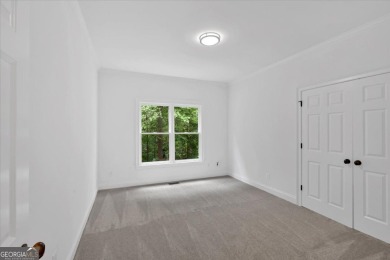 Welcome to 511 Millwood Ct-a beautifully updated 5-bedroom on Bridgemill Golf Club in Georgia - for sale on GolfHomes.com, golf home, golf lot
