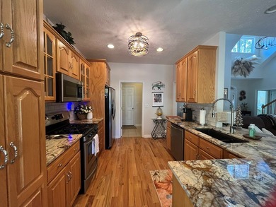 Charming 4BR/3BA brick home overlooking the signature 16th hole on Glade Springs Resort Golf Course in West Virginia - for sale on GolfHomes.com, golf home, golf lot