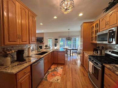 Charming 4BR/3BA brick home overlooking the signature 16th hole on Glade Springs Resort Golf Course in West Virginia - for sale on GolfHomes.com, golf home, golf lot