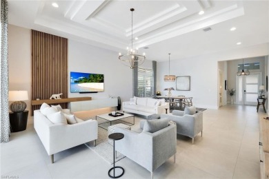 Discover this Beautiful Modern Elegant home in the exclusive on The Golf Club At Fiddlers Creek in Florida - for sale on GolfHomes.com, golf home, golf lot