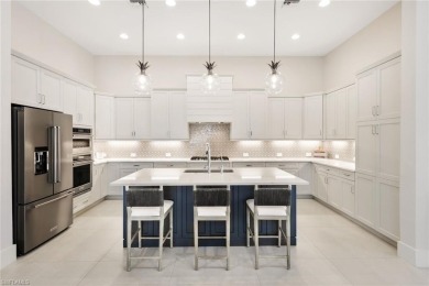 Discover this Beautiful Modern Elegant home in the exclusive on The Golf Club At Fiddlers Creek in Florida - for sale on GolfHomes.com, golf home, golf lot