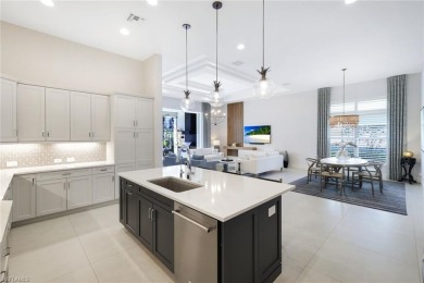 Discover this Beautiful Modern Elegant home in the exclusive on The Golf Club At Fiddlers Creek in Florida - for sale on GolfHomes.com, golf home, golf lot