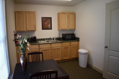 Need office space in a great location?  Situated between two on Players Course At Wyboo Plantation in South Carolina - for sale on GolfHomes.com, golf home, golf lot