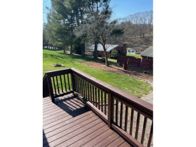 This charming 2-bedroom, 1-bathroom home with an attached garage on Holston Hills Country Club in Virginia - for sale on GolfHomes.com, golf home, golf lot